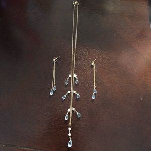 14K gold blue topaz set